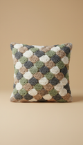 Housse de coussin motif galet crocheté